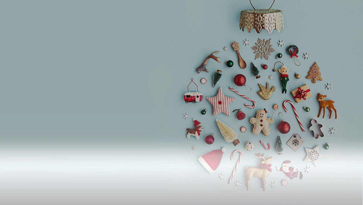Various Christmas decorations in a circle.